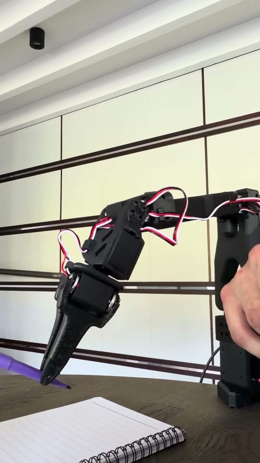 SO-101 robotic arm during an AI-driven manipulation run